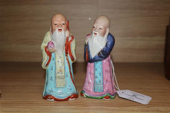 Two Chinese porcelain figures of a Sage height 14cm